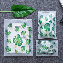 Load image into Gallery viewer, Leaf Print Transparent Travel Storage Bag Waterproof Sealed Eco Friendly Travel Luggage Clothes Sorting Bags Kitchen Accessories
