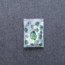 Load image into Gallery viewer, Leaf Print Transparent Travel Storage Bag Waterproof Sealed Eco Friendly Travel Luggage Clothes Sorting Bags Kitchen Accessories

